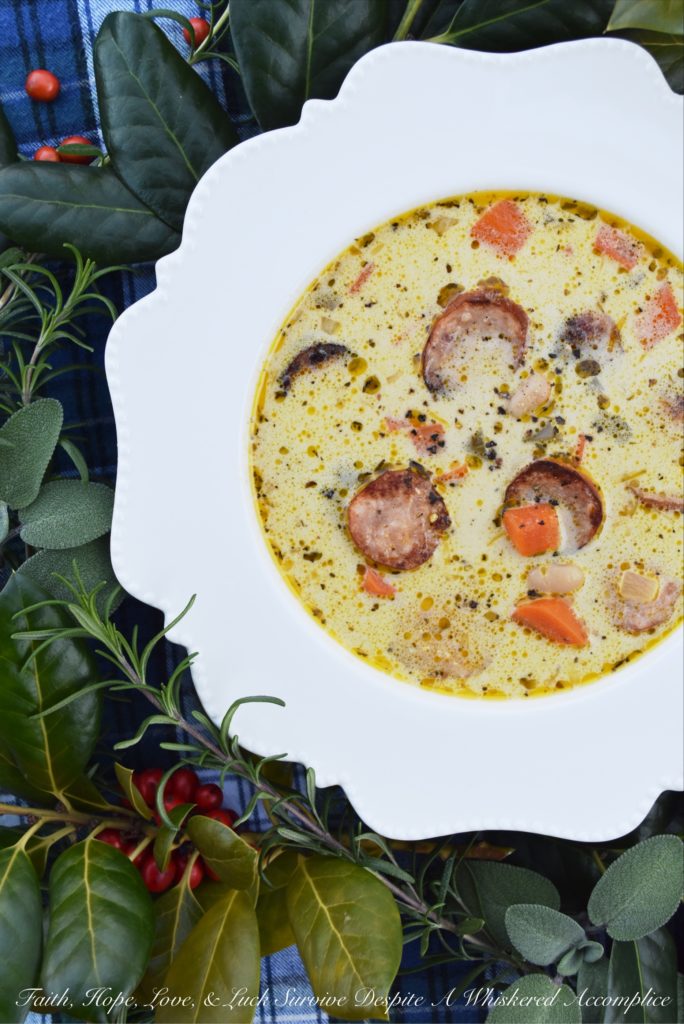 Kielbasa, Beer, & Bean Winter Soup - The only thing better than a comforting bowl of soup is a comforting bowl of soup that can be made using only one pot. I'm fairly certain that you'll find this one-pot recipe, using Polish kielbasa, beer, great northern beans, and a few additional herbs and vegetables, to be an immense blessing when it comes to making a warm, comforting, well-balanced meal on a busy winter weeknight.
