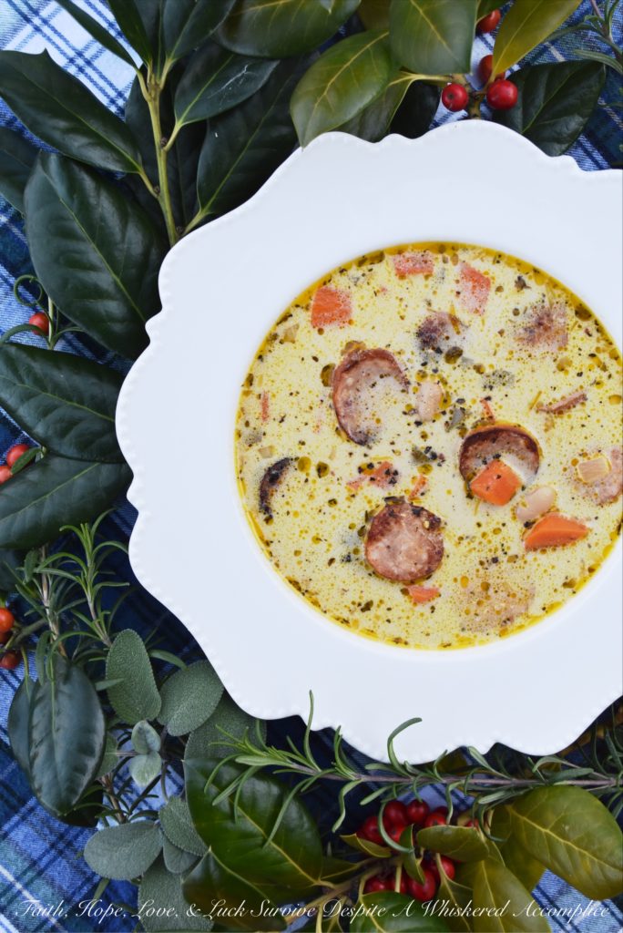 Kielbasa, Beer, & Bean Winter Soup - The only thing better than a comforting bowl of soup is a comforting bowl of soup that can be made using only one pot. I'm fairly certain that you'll find this one-pot recipe, using Polish kielbasa, beer, great northern beans, and a few additional herbs and vegetables, to be an immense blessing when it comes to making a warm, comforting, well-balanced meal on a busy winter weeknight.