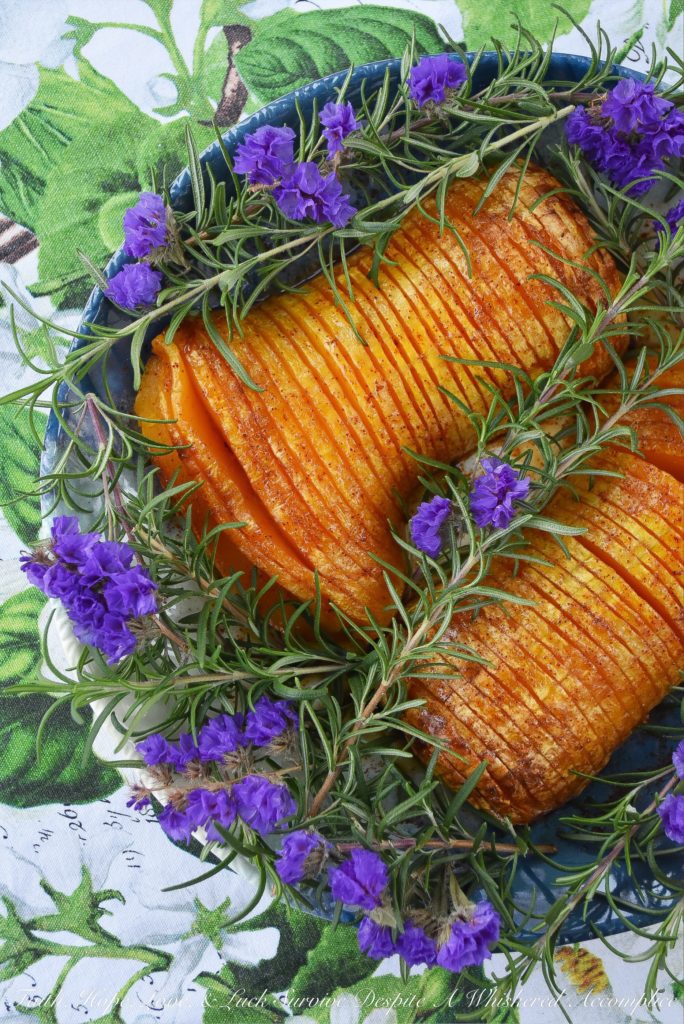 Maple Chipotle Hasselback Butternut Squash - Butternut squash makes the perfect holiday side dish, especially when it's Hasselback butternut squash. The thin slits cut into each squash half allow the butter, maple syrup, brown sugar, and ground chipotle mixture to get in every single nook and cranny, which means more flavor in each pretty little bite, making this one Thanksgiving side that everyone at your holiday table will be super-excited to gobble up.