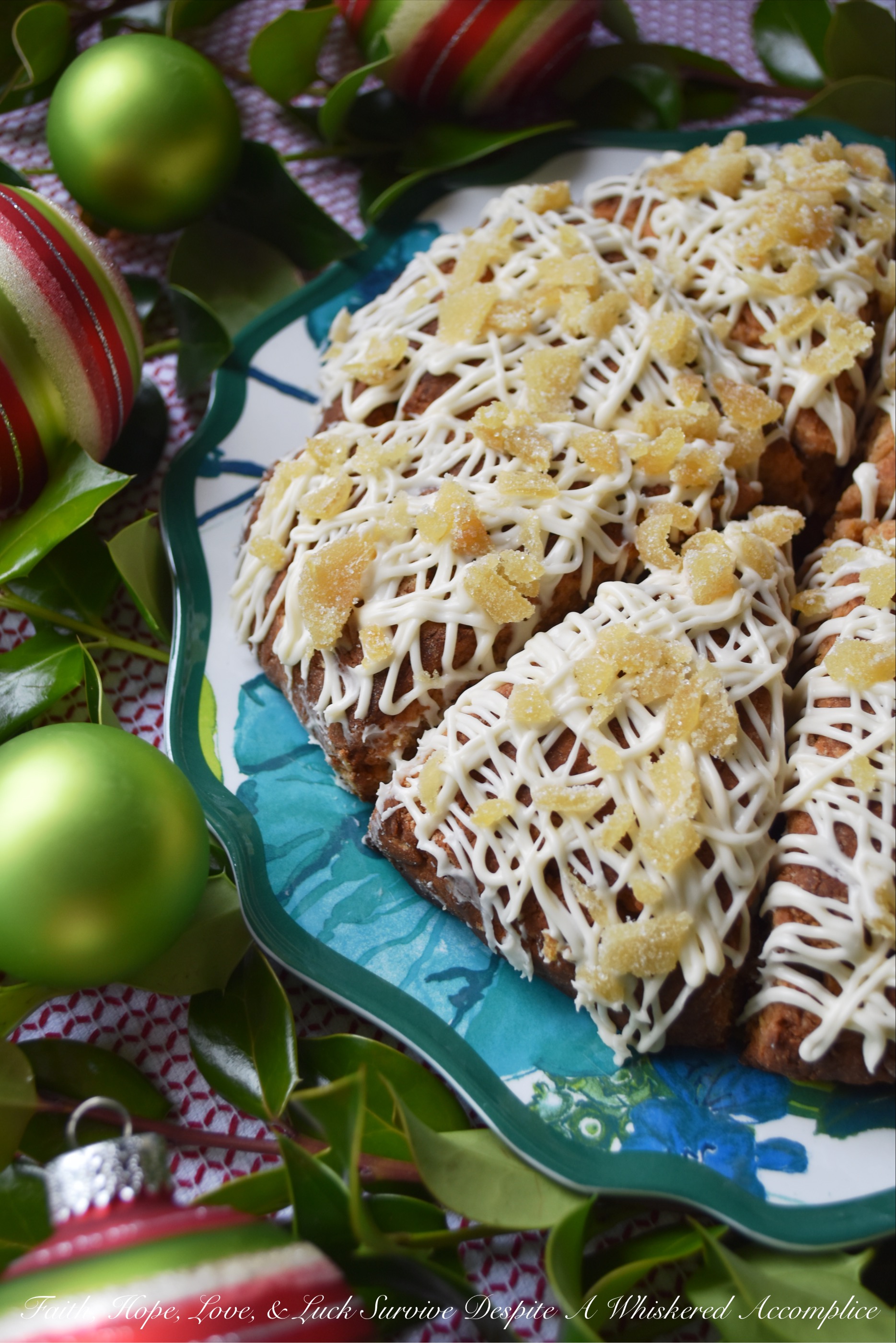 Vanilla Glazed Gingerbread Scones - Most people think of cookies when they hear the word gingerbread, however, gingerbread is a flavor that works fantastically with all sorts of delicious holiday baked goods, like these flavorful gingerbread scones. After being drizzled with a vanilla glaze, and then garnished with finely chopped crystallized ginger, these scones become quite the festive Christmas breakfast or dessert treat.