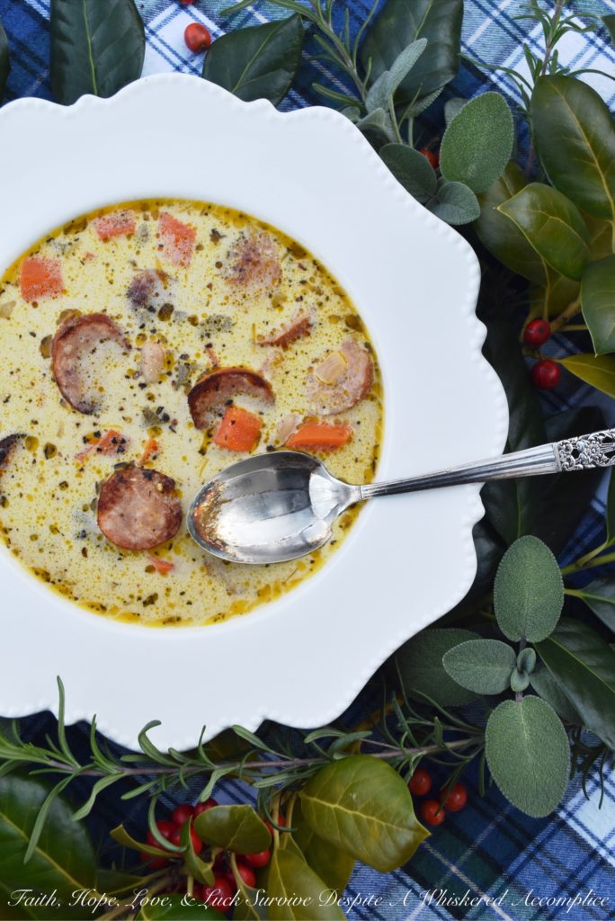 Kielbasa, Beer, & Bean Winter Soup - The only thing better than a comforting bowl of soup is a comforting bowl of soup that can be made using only one pot. I'm fairly certain that you'll find this one-pot recipe, using Polish kielbasa, beer, great northern beans, and a few additional herbs and vegetables, to be an immense blessing when it comes to making a warm, comforting, well-balanced meal on a busy winter weeknight.