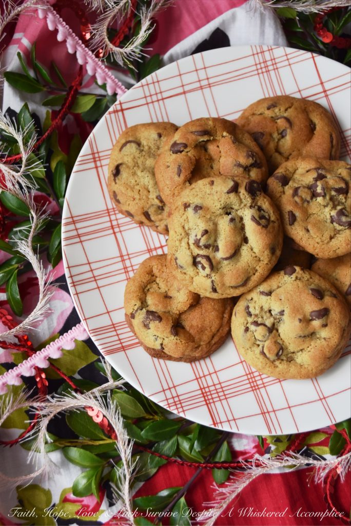 Chocolate Chip Vanilla Cookies - These simple and unassuming chocolate chip cookies are so much more than they first appear. They're soft and chewy, but also have an intense vanilla flavor that helps to bring out the taste of the semi-chocolate chips in them as well. In addition, they somehow manage to get even better after sitting for a few days after they are baked, which makes them the perfect Christmas cookie to add to a holiday cookie tray.