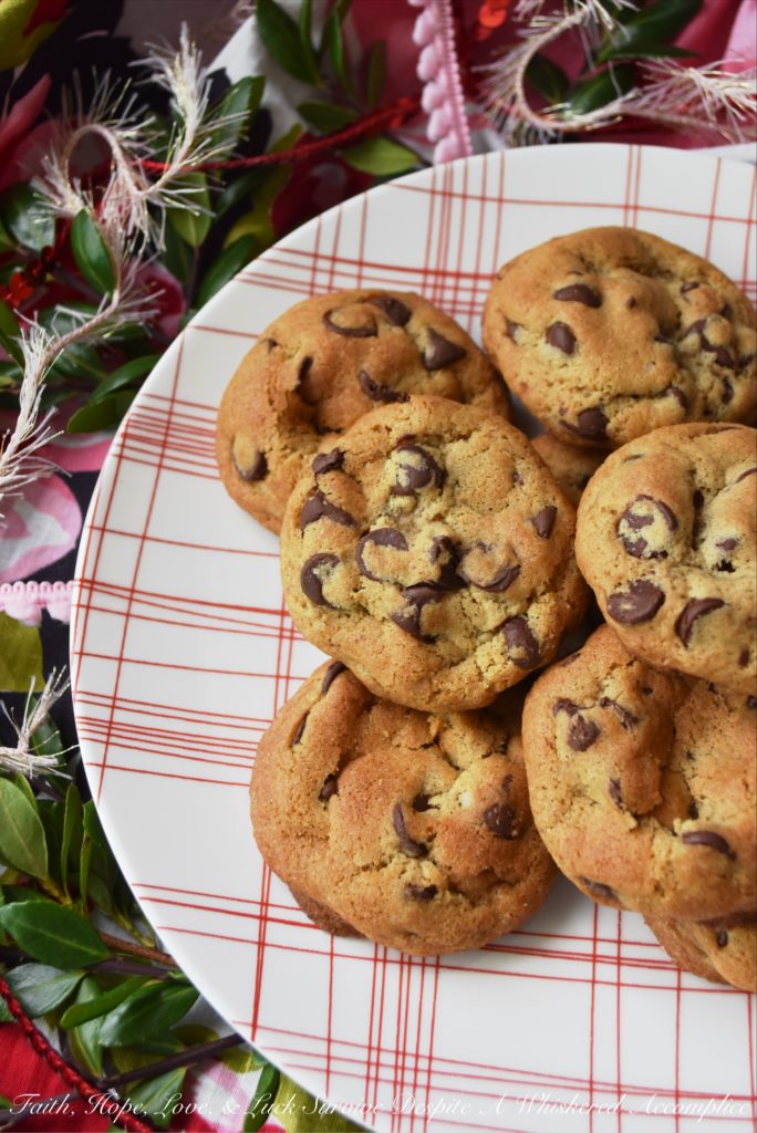 Chocolate Chip Vanilla Cookies - These simple and unassuming chocolate chip cookies are so much more than they first appear. They're soft and chewy, but also have an intense vanilla flavor that helps to bring out the taste of the semi-chocolate chips in them as well. In addition, they somehow manage to get even better after sitting for a few days after they are baked, which makes them the perfect Christmas cookie to add to a holiday cookie tray.