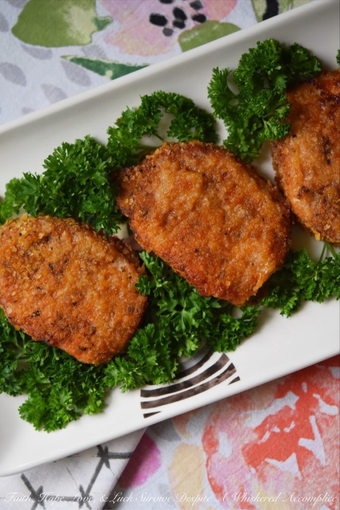 Baked BBQ Potato Chip Crusted Pork Chops - We're counting down the days until New Year's 2019 by sharing our best and favorite mouth-watering main dish recipes of the year 2018.