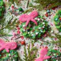 Whoville Christmas Wreath Sugar Cookies - All the little Whos in Whoville will simply adore these Whoville Christmas Wreath Sugar Cookies. To decorate these vivid green and pink buttercream icing frosted Christmas sugar cookies, simply break out your brightest and most whimsical sprinkles. When it comes to decorating these Christmas wreaths, there's no need to be a Grinch, don't hold back. In this case, more sprinkles is definitely a good thing.