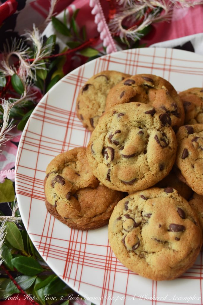 Chocolate Chip Vanilla Cookies - These simple and unassuming chocolate chip cookies are so much more than they first appear. They're soft and chewy, but also have an intense vanilla flavor that helps to bring out the taste of the semi-chocolate chips in them as well. In addition, they somehow manage to get even better after sitting for a few days after they are baked, which makes them the perfect Christmas cookie to add to a holiday cookie tray.