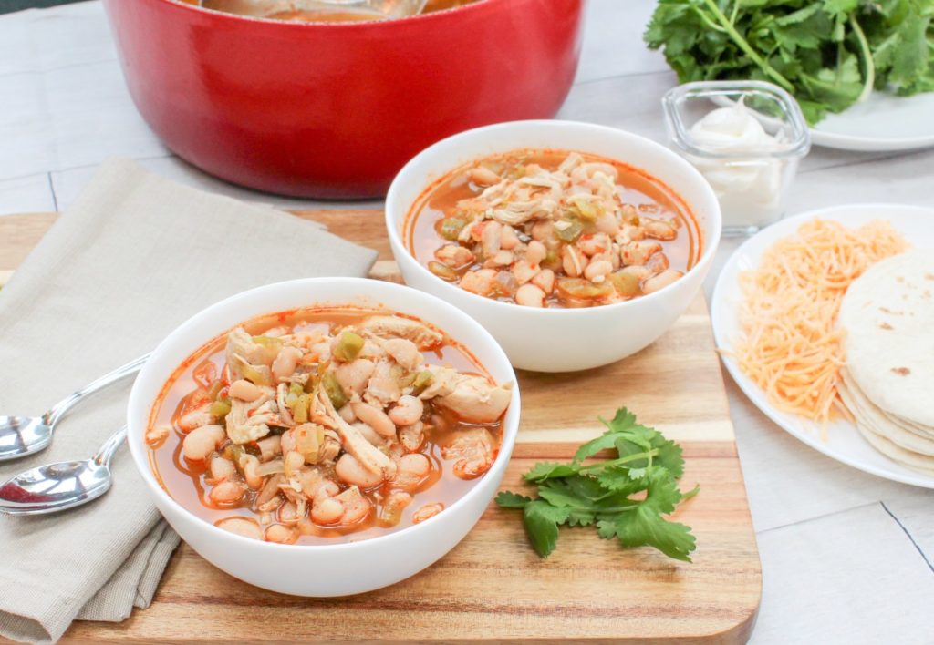 Weeknight White Chicken Chili - A Cheese Curd in Paradise - Now that the holidays are over and winter is here, it's time to break out the cozy winter recipes. Our recipe round-up this month, features lots of unique and delicious recipes to help you get over the winter blues, whether it be on a weekend when you have a little bit of extra time to spend in the kitchen, or on a busy weeknight when you're exhausted from shoveling snow.