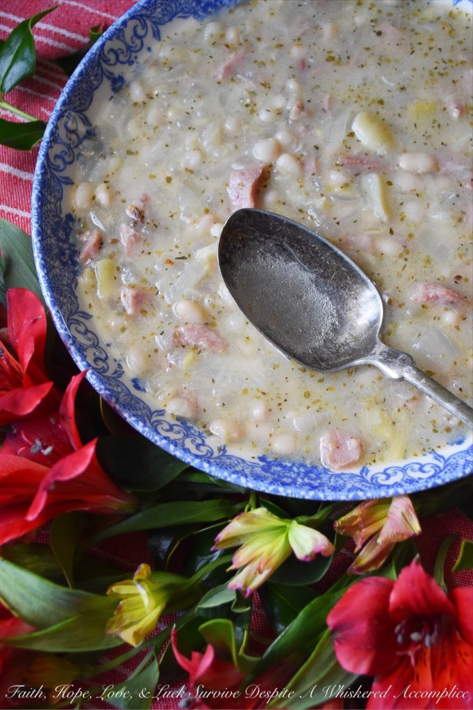 Italian Asiago Artichoke Ham & Bean Soup - Winter soups are great to make when you're starting to get the mid-winter blahs. Not only do they help raise the temperature in the kitchen, but they also help cheer you up with their comforting warmth and aroma. This particular winter soup uses dried beans, ham, jarred marinated artichoke hearts, and grated Asiago cheese, along with several other Italian herbs and spices. It's total comfort food.