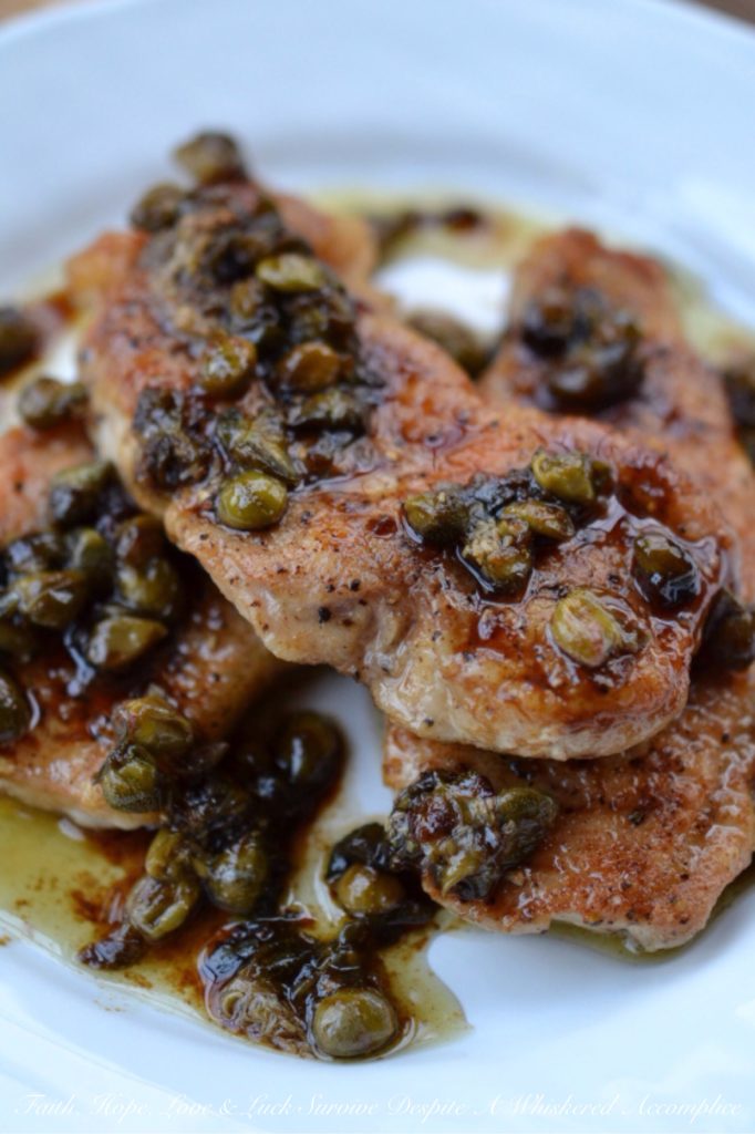 Sweet Tea Pork Piccata - Thin seasoned and flour-dredged pork chops are quickly sautéed over medium-high heat to absolute golden perfection. Then, the same pan is used to make a fast and absolutely amazing piccata pan sauce using sweet tea vodka, lemon juice, and capers. Not only is this is an easy and quick weeknight dish, but it's also lovely to serve alongside a salad, pasta, rice, potatoes, or even vegetables.