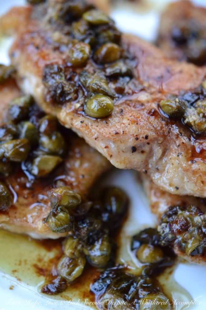 Sweet Tea Pork Piccata - Thin seasoned and flour-dredged pork chops are quickly sautéed over medium-high heat to absolute golden perfection. Then, the same pan is used to make a fast and absolutely amazing piccata pan sauce using sweet tea vodka, lemon juice, and capers. Not only is this is an easy and quick weeknight dish, but it's also lovely to serve alongside a salad, pasta, rice, potatoes, or even vegetables.