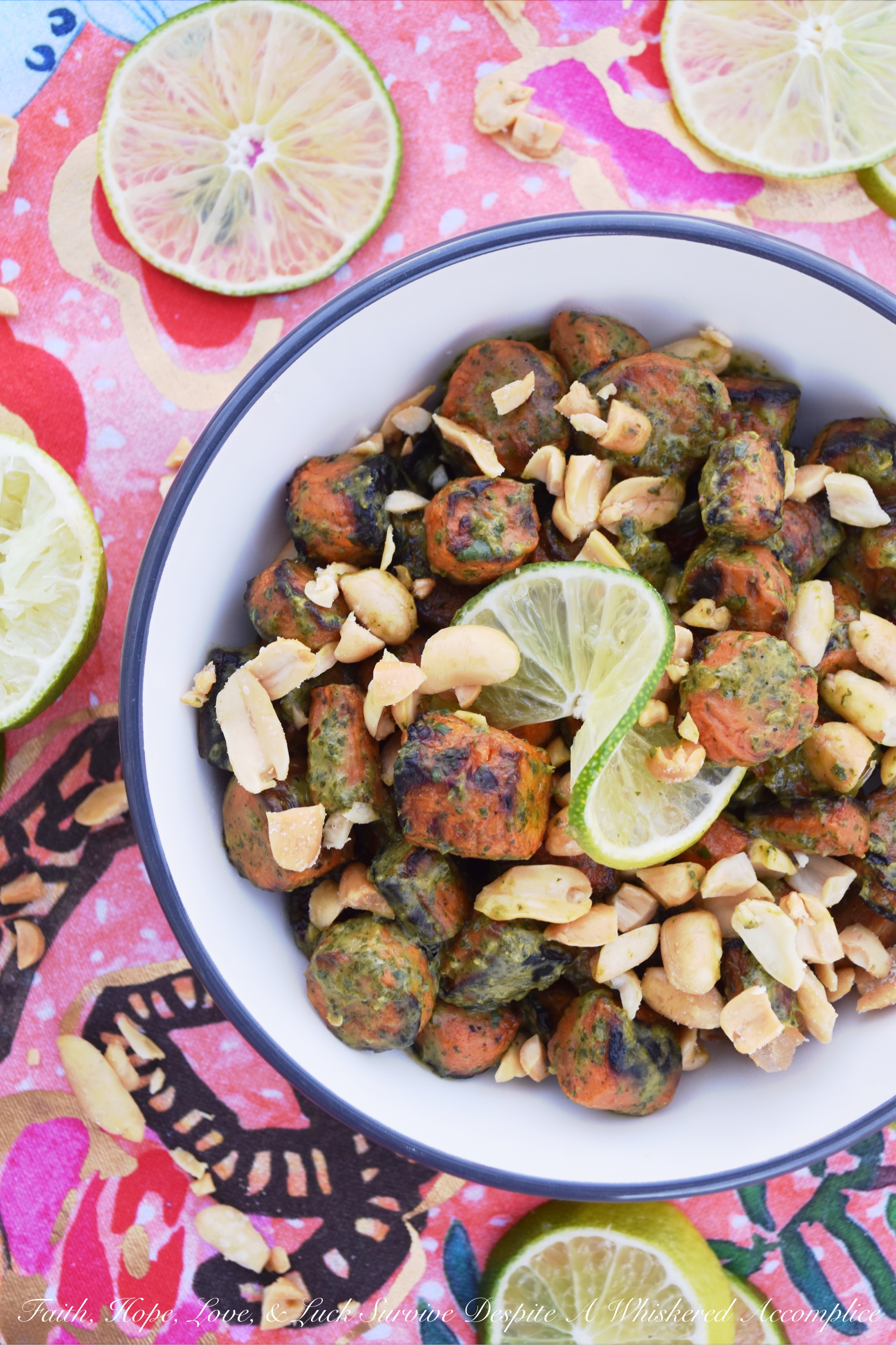 Vegan Thai Roasted Carrots with Peanuts - Transform basic roasted carrots into a truly extraordinary vegan side dish with a simple Thai sauce made using fresh cilantro, lime juice, peanut butter, salt, and crushed red pepper flakes. Add a few roughly chopped salted roasted peanuts before serving, and you'll have a flavorful healthy vegetable dish your entire family will ask for again and again.