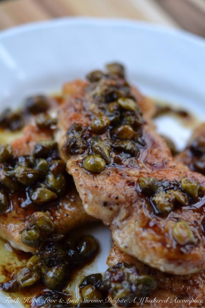 Sweet Tea Pork Piccata - Thin seasoned and flour-dredged pork chops are quickly sautéed over medium-high heat to absolute golden perfection. Then, the same pan is used to make a fast and absolutely amazing piccata pan sauce using sweet tea vodka, lemon juice, and capers. Not only is this is an easy and quick weeknight dish, but it's also lovely to serve alongside a salad, pasta, rice, potatoes, or even vegetables.