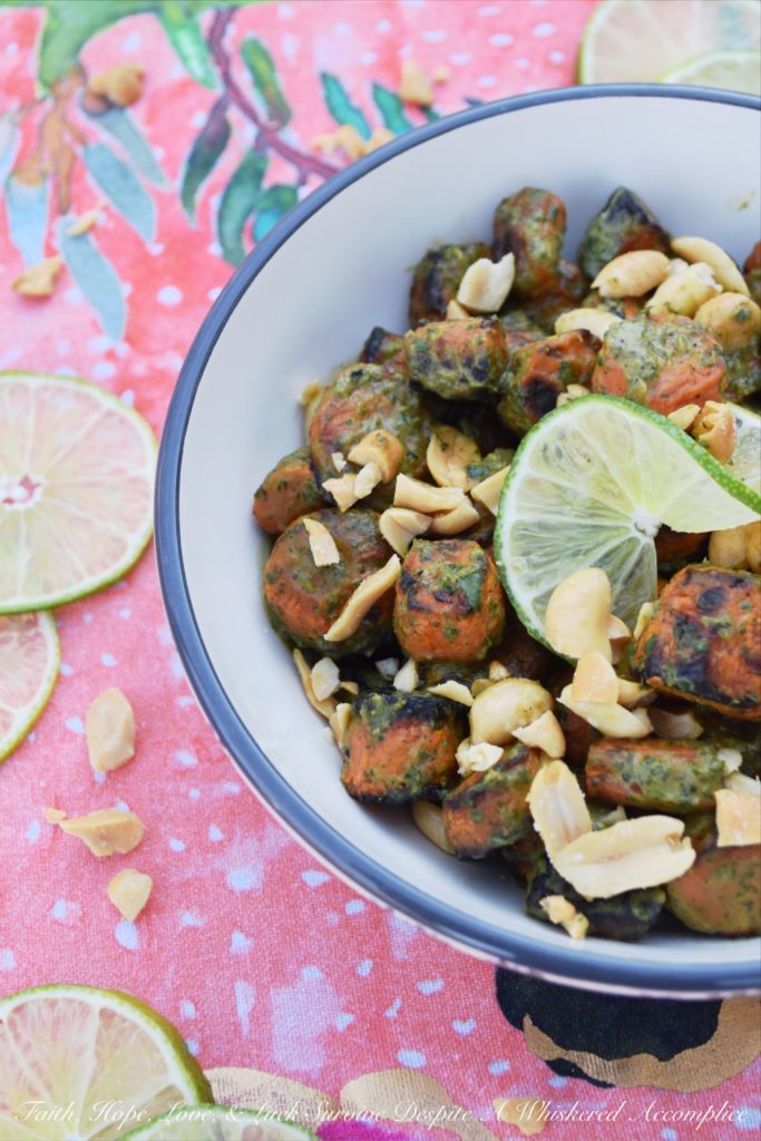 Vegan Thai Roasted Carrots with Peanuts - Transform basic roasted carrots into a truly extraordinary vegan side dish with a simple Thai sauce made using fresh cilantro, lime juice, peanut butter, salt, and crushed red pepper flakes. Add a few roughly chopped salted roasted peanuts before serving, and you'll have a flavorful healthy vegetable dish your entire family will ask for again and again.