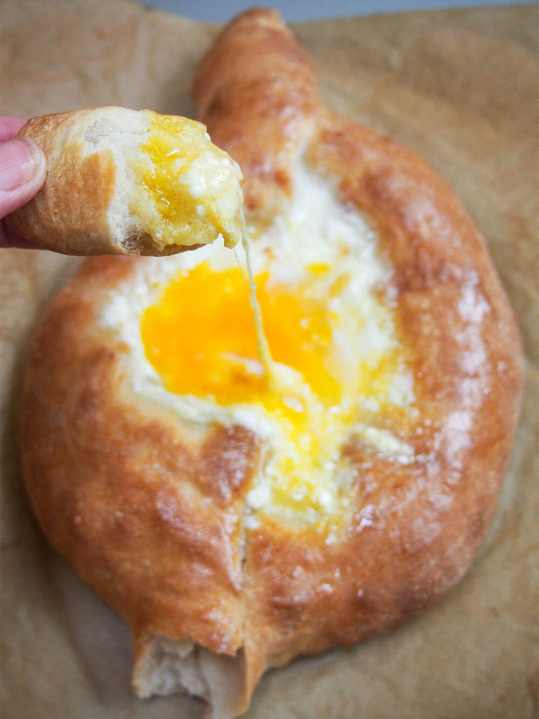 Adjaruli Khachapuri (Georgian Cheese Bread) - Caroline's Cooking - Welcome to Friday! Friday! Friday! Favorites! Each Friday we'll be sharing our favorite recipes of the week from other fabulous food bloggers, so make sure to visit and see what tasty over-the-top dishes we're most excited about.