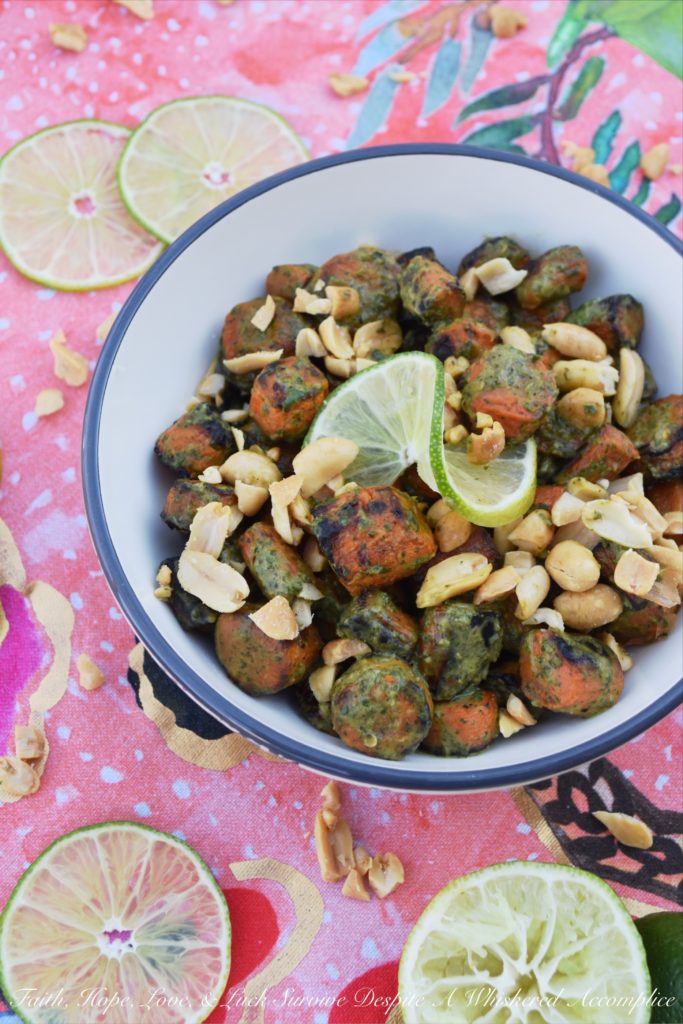 Vegan Thai Roasted Carrots with Peanuts - Transform basic roasted carrots into a truly extraordinary vegan side dish with a simple Thai sauce made using fresh cilantro, lime juice, peanut butter, salt, and crushed red pepper flakes. Add a few roughly chopped salted roasted peanuts before serving, and you'll have a flavorful healthy vegetable dish your entire family will ask for again and again.