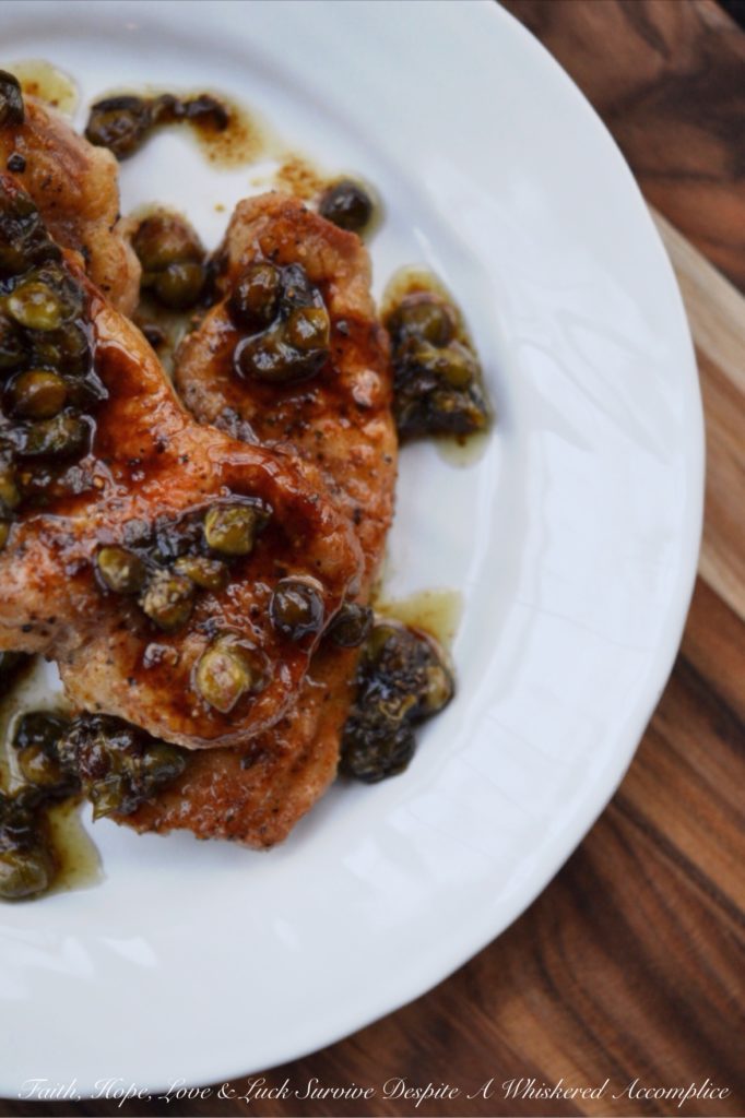 Sweet Tea Pork Piccata - Thin seasoned and flour-dredged pork chops are quickly sautéed over medium-high heat to absolute golden perfection. Then, the same pan is used to make a fast and absolutely amazing piccata pan sauce using sweet tea vodka, lemon juice, and capers. Not only is this is an easy and quick weeknight dish, but it's also lovely to serve alongside a salad, pasta, rice, potatoes, or even vegetables.