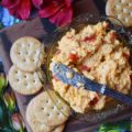 Sweet Gherkin Pimento Cheese Spread - Looking for an easy-to-make appetizer to bring along to your next party, game, or get-together? Why not try making pimento cheese spread? This quick cheesy snack uses sweet gherkin pickles for added sweetness and texture. Once you start eating it, you won't want to stop.