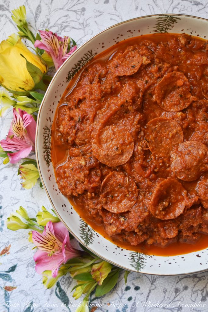 Pepperoni & Sausage Pizza Pasta Sauce - Looking for a pasta sauce that's packed with flavor and doesn't come from a jar? This pepperoni and Italian sausage-loaded pasta sauce is like having a pizza without the actual crust. Serve it over pasta, gnocchi, garlic bread, or even use it as a dipping sauce for grilled mozzarella cheese sandwiches.