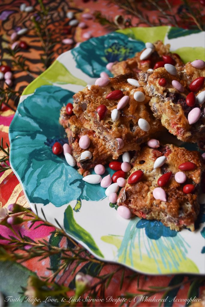 Chocolate Covered Sunflower Seed Krispies Bars - These absolutely amazing sweet, chewy, and crispy cookie bars are half s'mores bar and half rice krispies treat. Basically, they are pretty much the best of both worlds. Add in the fact that they are both filled and topped with chocolate covered sunflower seeds, and what's not to totally fall in love with?