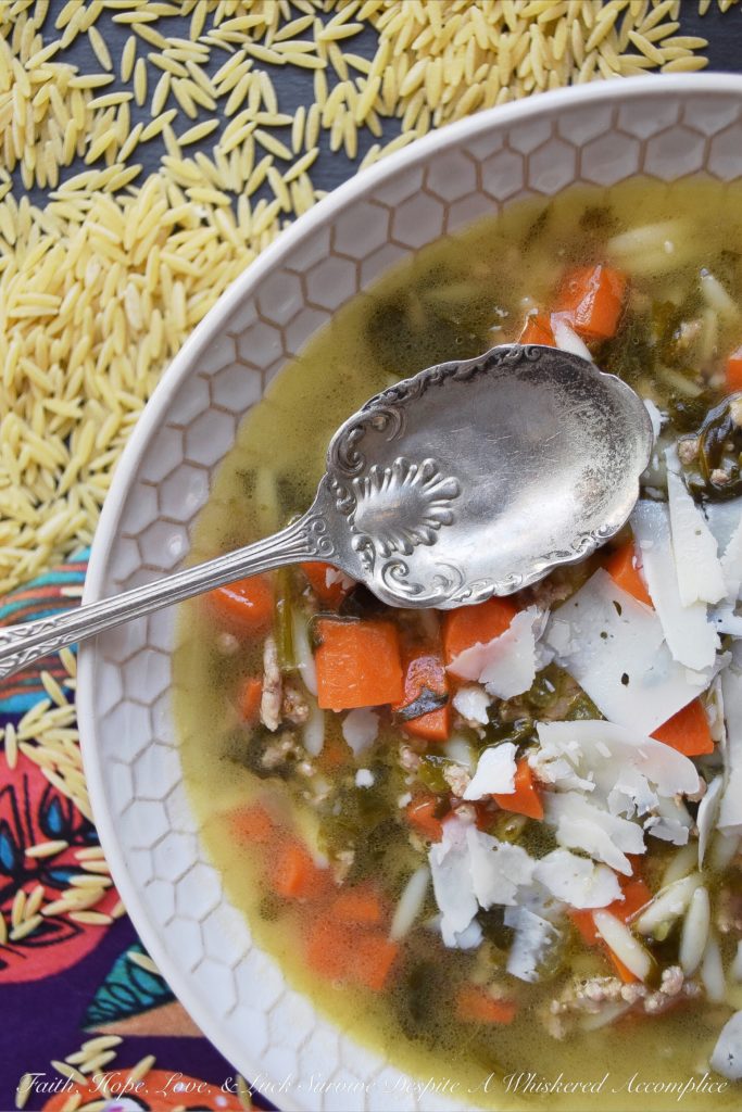 Colleen's One-Pot Italian Orzo Wedding Soup - Italian Wedding Soup is always a winning soup recipe, however, it can be a little time-consuming to make. This one-pot recipe using orzo and a mixture of ground beef, veal, and pork, takes all of the work out of making this soup. Forget about making itty bitty tiny meatballs, just brown the ground meat instead. All of the taste, none of the hassle.