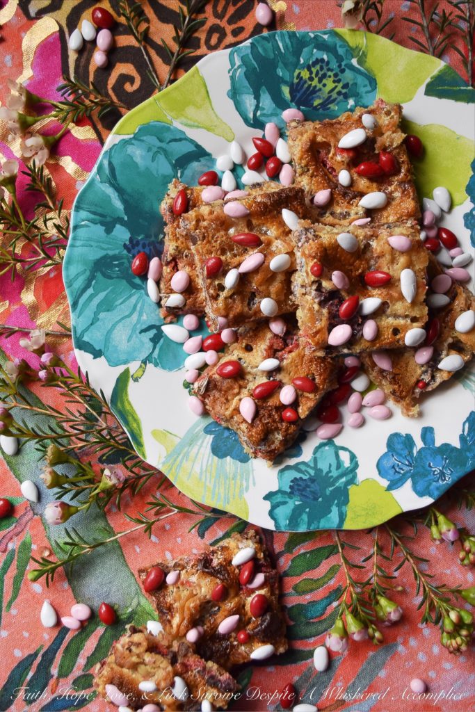 Chocolate Covered Sunflower Seed Krispies Bars - These absolutely amazing sweet, chewy, and crispy cookie bars are half s'mores bar and half rice krispies treat. Basically, they are pretty much the best of both worlds. Add in the fact that they are both filled and topped with chocolate covered sunflower seeds, and what's not to totally fall in love with?