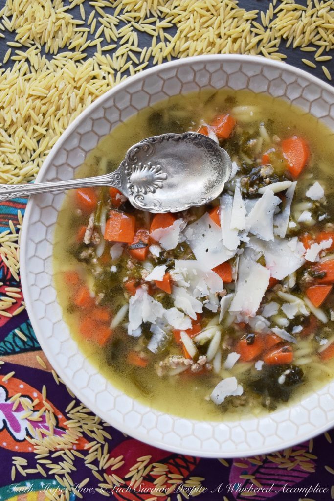 Colleen's One-Pot Italian Orzo Wedding Soup - Italian Wedding Soup is always a winning soup recipe, however, it can be a little time-consuming to make. This one-pot recipe using orzo and a mixture of ground beef, veal, and pork, takes all of the work out of making this soup. Forget about making itty bitty tiny meatballs, just brown the ground meat instead. All of the taste, none of the hassle.