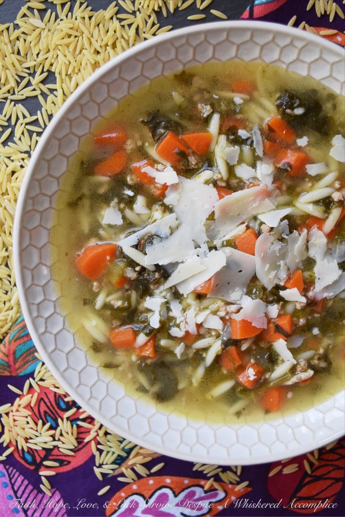 Colleen's One-Pot Italian Orzo Wedding Soup - Italian Wedding Soup is always a winning soup recipe, however, it can be a little time-consuming to make. This one-pot recipe using orzo and a mixture of ground beef, veal, and pork, takes all of the work out of making this soup. Forget about making itty bitty tiny meatballs, just brown the ground meat instead. All of the taste, none of the hassle.