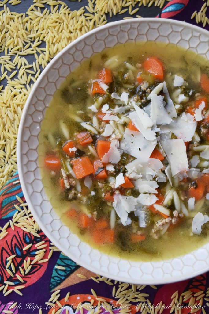 Colleen's One-Pot Italian Orzo Wedding Soup - Italian Wedding Soup is always a winning soup recipe, however, it can be a little time-consuming to make. This one-pot recipe using orzo and a mixture of ground beef, veal, and pork, takes all of the work out of making this soup. Forget about making itty bitty tiny meatballs, just brown the ground meat instead. All of the taste, none of the hassle.