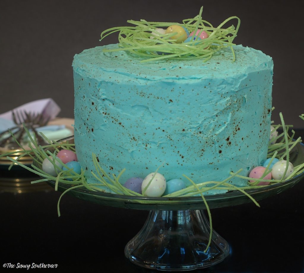 Easy Easter Cake with Speckled Buttercream Frosting - The Saucy Southerner - Now that winter is finally over, we're celebrating the warmer weather by sharing our favorite fresh springtime recipes. Come check out some of our favorite recipes, using fresh seasonal ingredients.