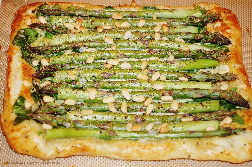 Spinach Asparagus Tart - The Saucy Southerner - Now that winter is finally over, we're celebrating the warmer weather by sharing our favorite fresh springtime recipes. Come check out some of our favorite recipes, using fresh seasonal ingredients.