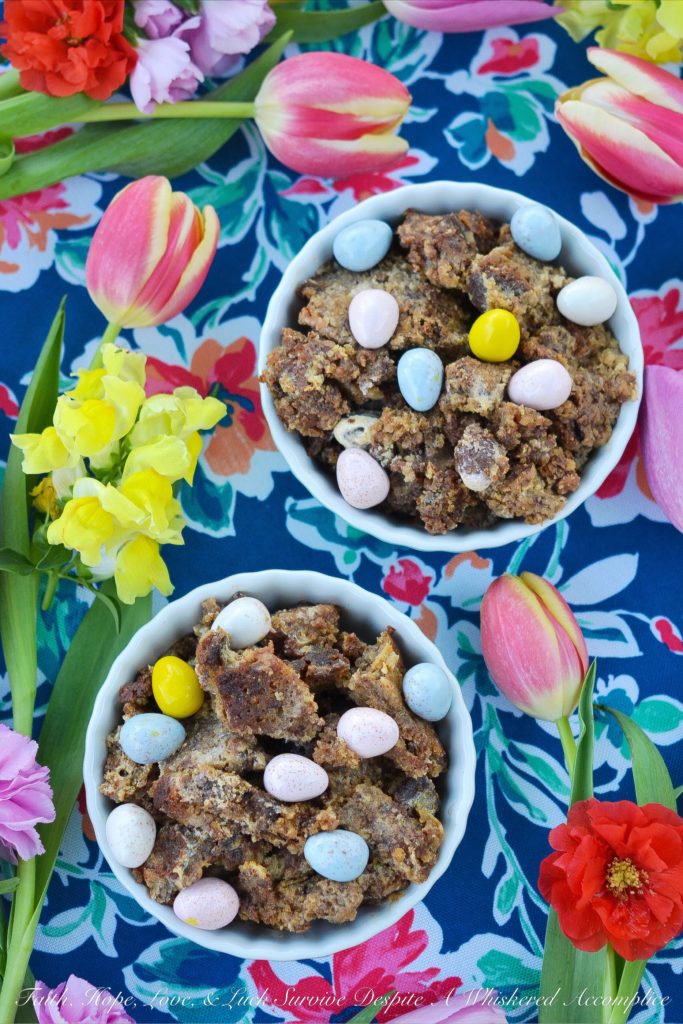 Banana Bread Pudding with Cadbury Mini Eggs - Easter wouldn't be Easter without Cadbury Mini Eggs. While eating them straight out of the bag is always a delicious treat, I prefer to transform them into something even more delicious by adding them to banana bread and then using that same banana bread to make a bread pudding dessert topped with a warm vanilla sauce and even more Cadbury Mini Eggs.