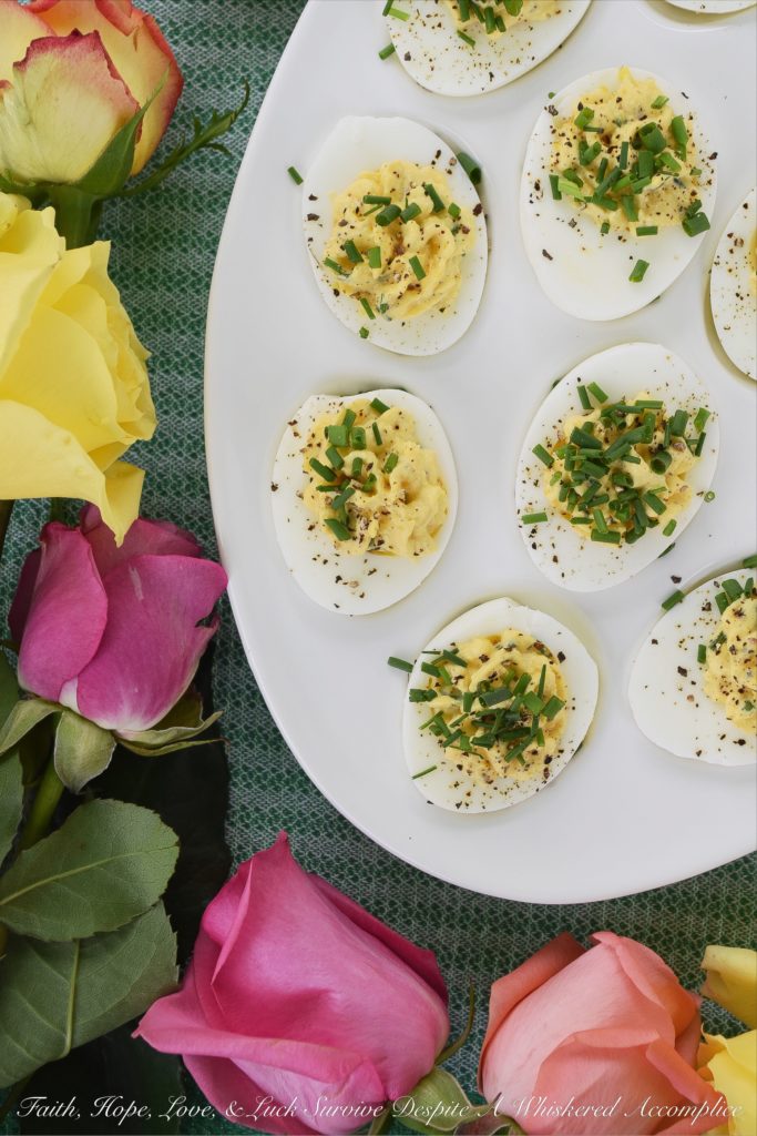 Sour Cream & Chive Stuffed Deviled Eggs - Ditch the mayonnaise. These stuffed deviled eggs are made using only sour cream, with the addition of fresh chives and a few other spices. I guarantee you won't even miss the mayonnaise in this tasty deviled egg appetizer.