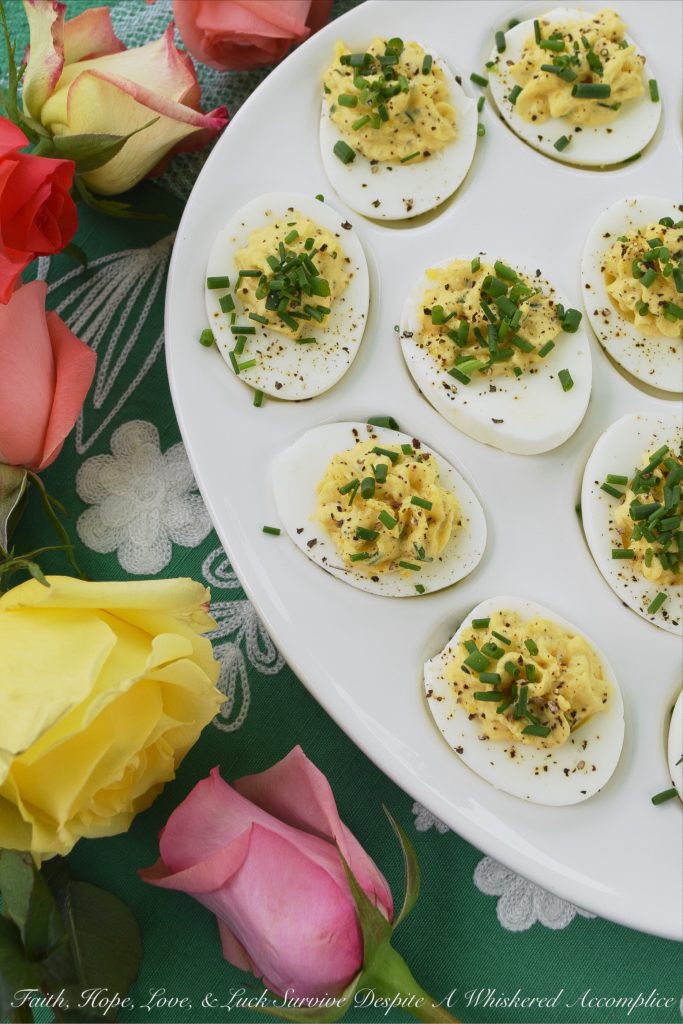 Sour Cream & Chive Stuffed Deviled Eggs - Ditch the mayonnaise. These stuffed deviled eggs are made using only sour cream, with the addition of fresh chives and a few other spices. I guarantee you won't even miss the mayonnaise in this tasty deviled egg appetizer.