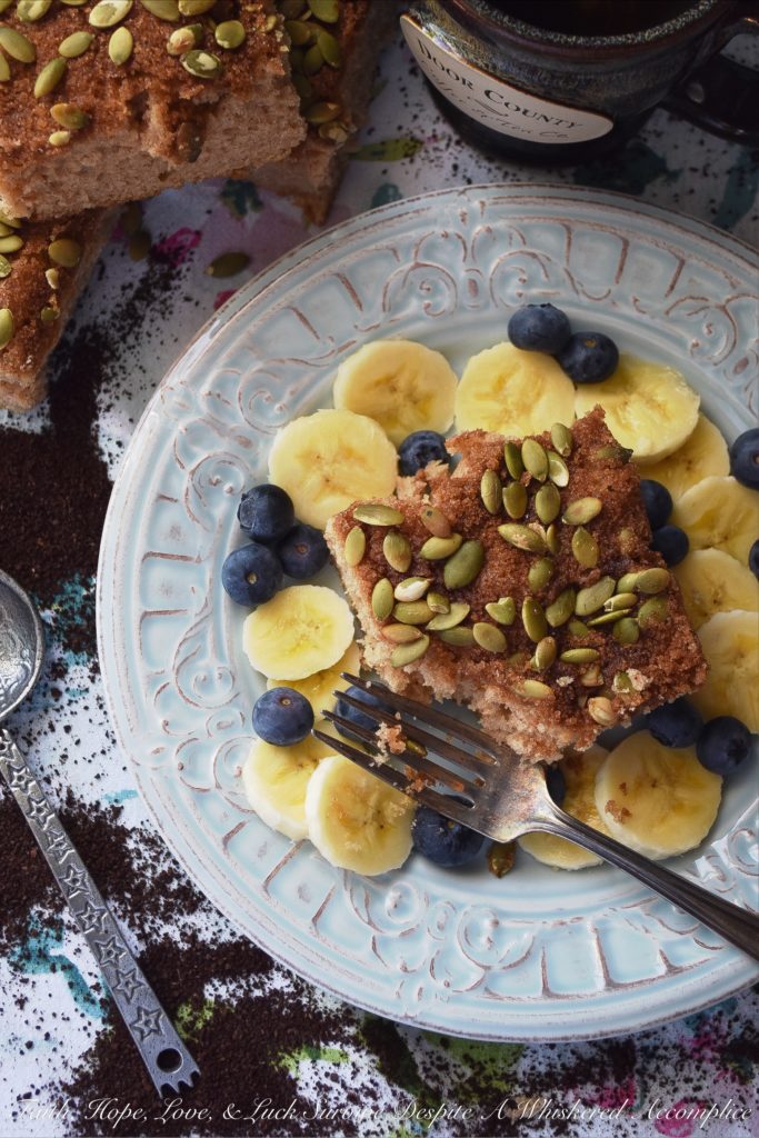 Overnight Make-Ahead Coffee Cake (Nut-Free) - This overnight make-ahead coffee cake recipe makes it super-simple to get breakfast on the table, whether it be a weekday or weekend morning. Pepitas, or roasted salted pumpkin seeds, give this coffee-cake a lovely nutty flavor while still allowing it to be nut-free for those with allergies. Simply remove the cake from the refrigerator in the morning, preheat your oven, and then bake to perfection.