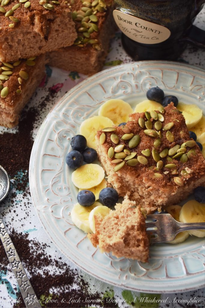 Overnight Make-Ahead Coffee Cake (Nut-Free) - This overnight make-ahead coffee cake recipe makes it super-simple to get breakfast on the table, whether it be a weekday or weekend morning. Pepitas, or roasted salted pumpkin seeds, give this coffee-cake a lovely nutty flavor while still allowing it to be nut-free for those with allergies. Simply remove the cake from the refrigerator in the morning, preheat your oven, and then bake to perfection.