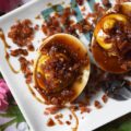 Deviled Eggs with Bacon & Bourbon Glaze - Unlike most deviled egg recipes, this one calls for 15 hard-boiled eggs instead of 12. You'll have 24 deviled eggs to serve at your cookout, picnic, or party, and 6 to sample and taste-test beforehand. No more sneaking a deviled egg, thus leaving an empty space in your egg tray. And, with tons of bacon and a homemade bourbon glaze, these are deviled eggs you're definitely going to want to sample.