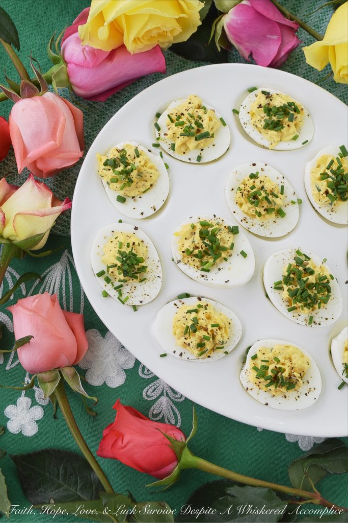 Sour Cream & Chive Stuffed Deviled Eggs - Ditch the mayonnaise. These stuffed deviled eggs are made using only sour cream, with the addition of fresh chives and a few other spices. I guarantee you won't even miss the mayonnaise in this tasty deviled egg appetizer.