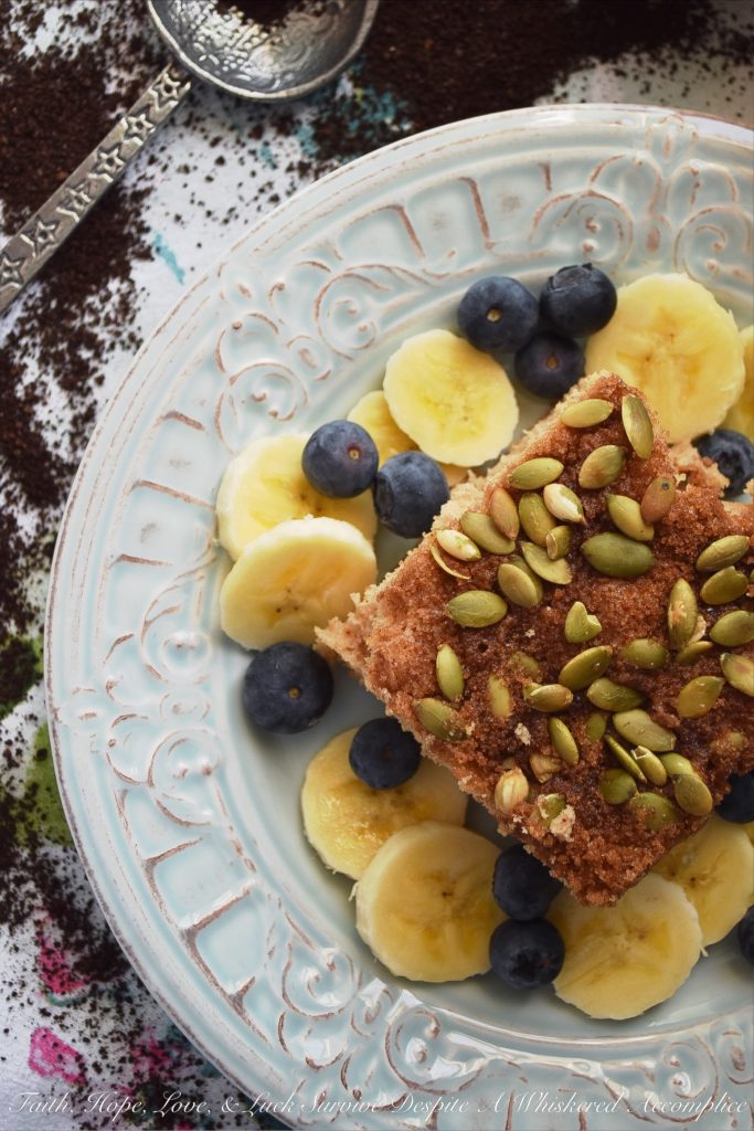 Overnight Make-Ahead Coffee Cake (Nut-Free) - This overnight make-ahead coffee cake recipe makes it super-simple to get breakfast on the table, whether it be a weekday or weekend morning. Pepitas, or roasted salted pumpkin seeds, give this coffee-cake a lovely nutty flavor while still allowing it to be nut-free for those with allergies. Simply remove the cake from the refrigerator in the morning, preheat your oven, and then bake to perfection.