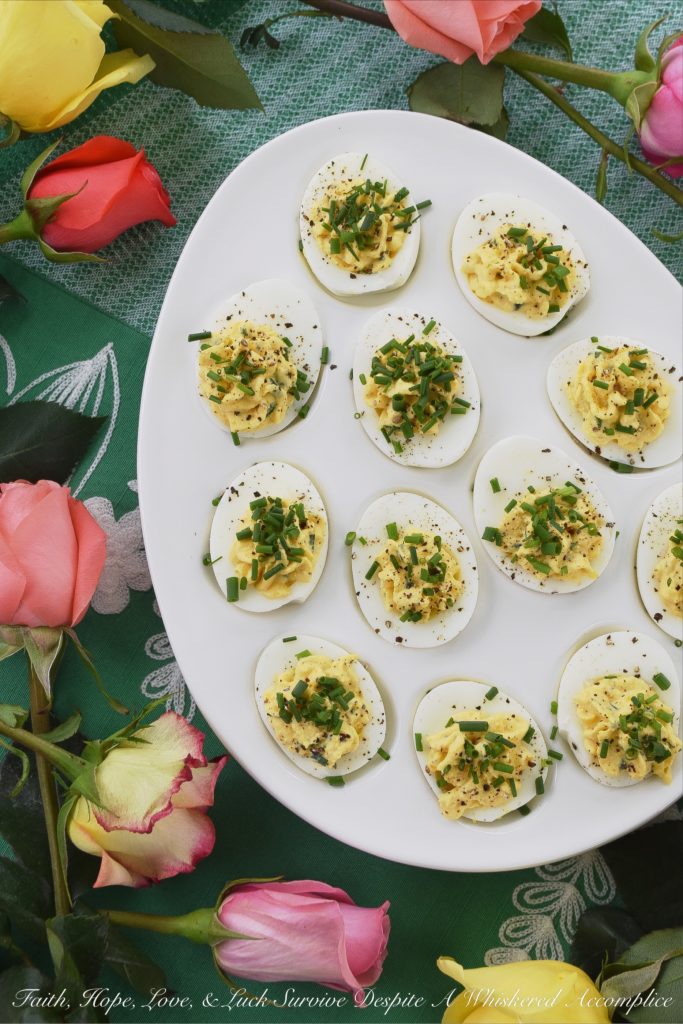 Sour Cream & Chive Stuffed Deviled Eggs - Ditch the mayonnaise. These stuffed deviled eggs are made using only sour cream, with the addition of fresh chives and a few other spices. I guarantee you won't even miss the mayonnaise in this tasty deviled egg appetizer.