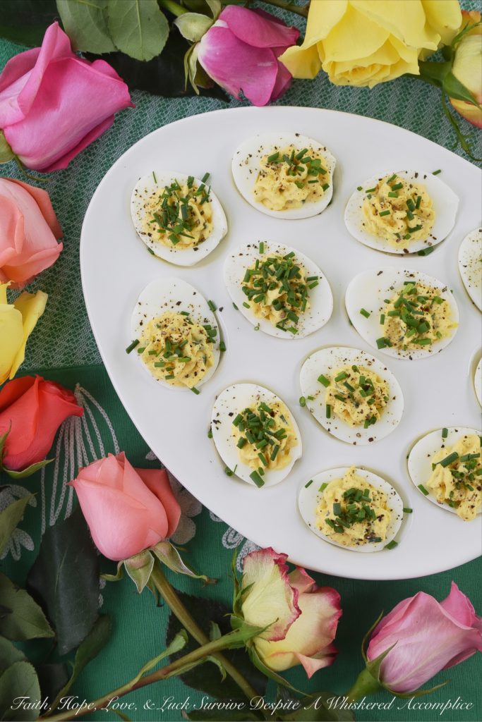 Sour Cream & Chive Stuffed Deviled Eggs - Ditch the mayonnaise. These stuffed deviled eggs are made using only sour cream, with the addition of fresh chives and a few other spices. I guarantee you won't even miss the mayonnaise in this tasty deviled egg appetizer.
