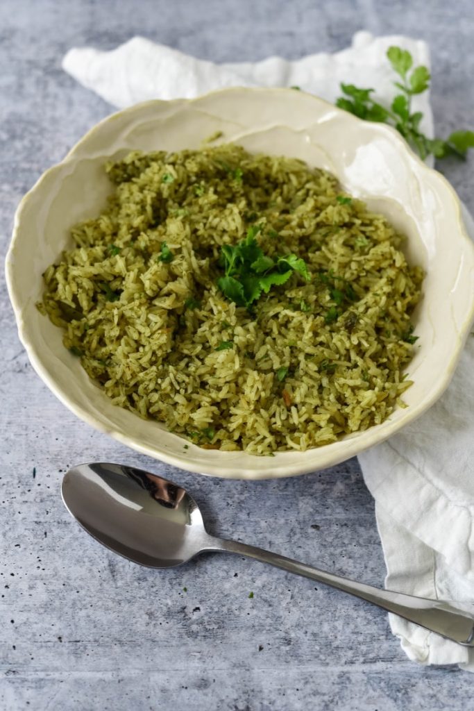 Mexican Green Rice - The Gingered Whisk - Welcome to Friday! Friday! Friday! Favorites! Each Friday we'll be sharing our favorite recipes of the week from other fabulous food bloggers, so make sure to visit and see what tasty over-the-top dishes we're most excited about.
