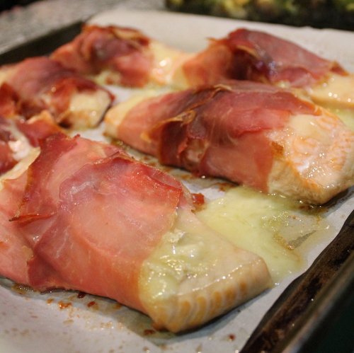 Prosciutto-Wrapped Salmon with Brie - Books n' Cooks - May 2019 Recipe Round-Up - April showers bring May flowers. This year, May also brings Mother's Day, so we're sharing some of our favorite mom-friendly recipes in our May Recipe Round-Up. Recipes that are perfect to make for your mom on Mother's Day to show her just how much you love and cherish her.