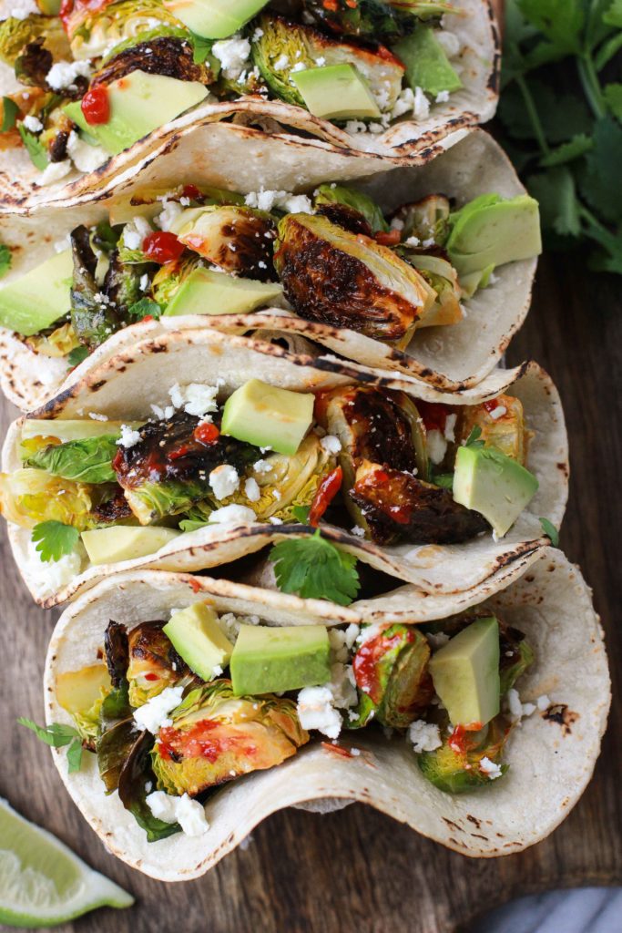 Spicy Brussels Sprout Tacos - I Heart Vegetables - Welcome to Friday! Friday! Friday! Favorites! Each Friday we'll be sharing our favorite recipes of the week from other fabulous food bloggers, so make sure to visit and see what tasty over-the-top dishes we're most excited about.