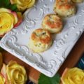Bread & Butter Pickle Buttermilk Biscuits - Not only do bread & butter pickles add flavor to traditional buttermilk biscuits, but they also add moisture, making these little biscuits fluffy, flavorful, and tenderly moist. Whether you eat them on their own or use them for bread to make a sandwich, I guarantee you'll enjoy their delicate deliciousness.