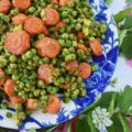 Warm Roasted Carrot & Pea Chipotle Salad - Not only is this warm roasted carrot and pea side salad colorful and full of flavor, but it's also the perfect vegetable salad to serve with almost any type of grilled meat or fish. The tiny bit of mayonnaise it contains gives it just the right amount of richness, and the lemon zest and chipotle lend a refreshing kick to the peas and carrots.