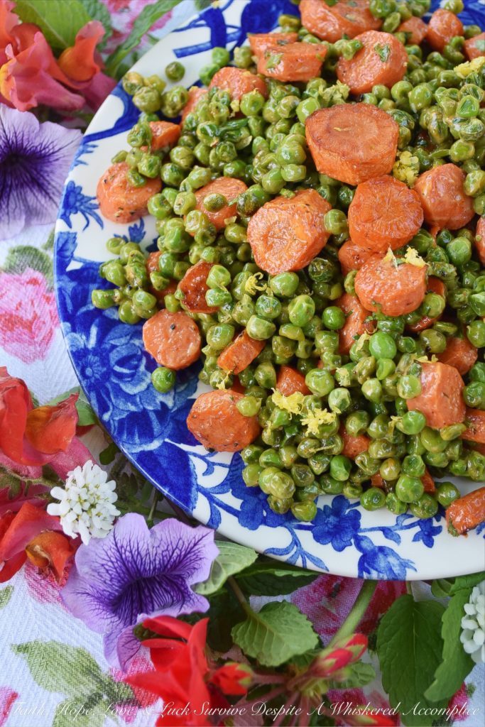 Warm Roasted Carrot & Pea Chipotle Salad - Not only is this warm roasted carrot and pea side salad colorful and full of flavor, but it's also the perfect vegetable salad to serve with almost any type of grilled meat or fish. The tiny bit of mayonnaise it contains gives it just the right amount of richness, and the lemon zest and chipotle lend a refreshing kick to the peas and carrots.