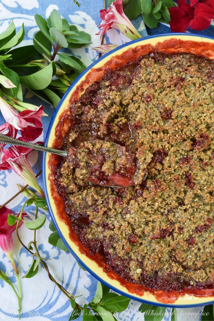 Strawberry Crisp with Pepita & Chia Seed Topping - It's often hard to achieve a truly crispy topping when baking a strawberry crisp if you aren't using nuts in the topping. This sweet summer strawberry crisp uses pepita and chia seeds to create the perfect crispy topping, for those who are allergic to nuts, who still crave a delicious crispy crunchy baked summer berry dessert.