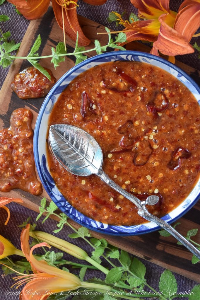 Sweet & Spicy Red Chili Garlic Sauce - This sweet and spicy homemade condiment, made with red chili peppers and a healthy amount of garlic, can be used to make just about any food more flavorful. It's really up to you how to use this sauce. You can use it to baste grilled seafood, marinate steak, or even to enhance the flavor of your favorite salad dressing or dip.