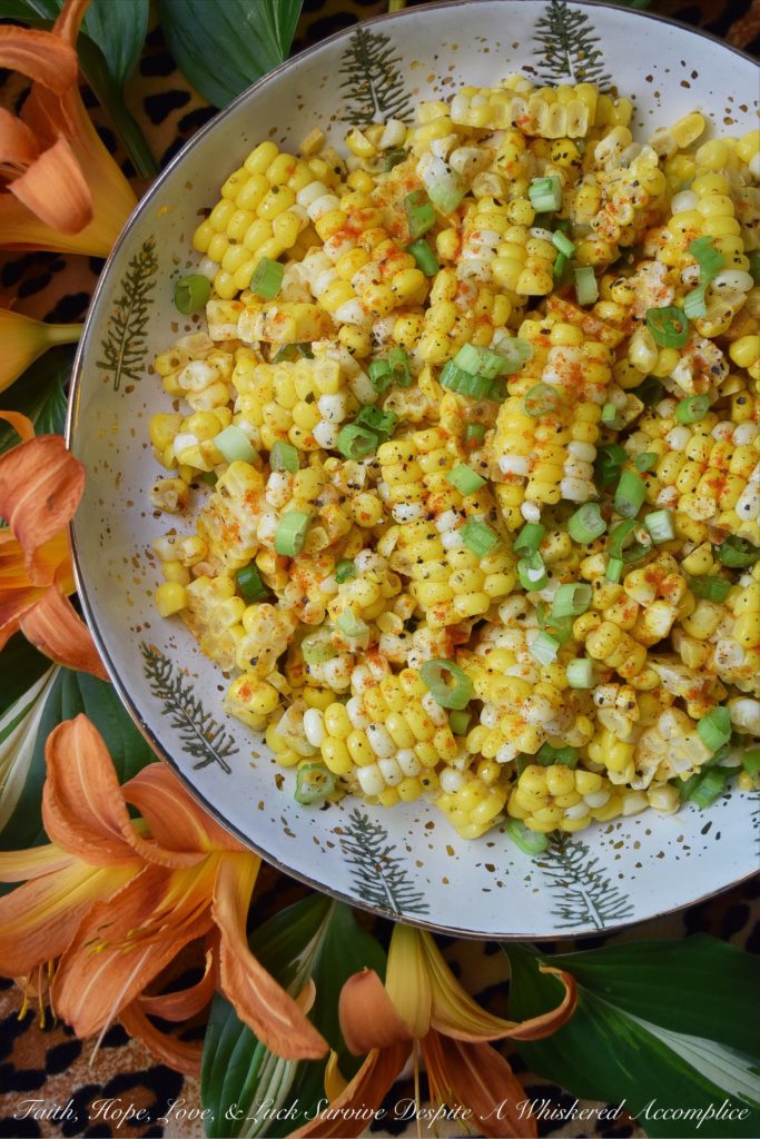 Smoky Ground Cumin & Paprika Corn Salad - Ground cumin and paprika add a lovely smoky flavor to this healthy corn salad. I can practically guarantee that this is one vegetable side dish your entire family will look forward to this summer. So, make sure to buy lots of corn the next time you're at your local grocery store or farmer's market.
