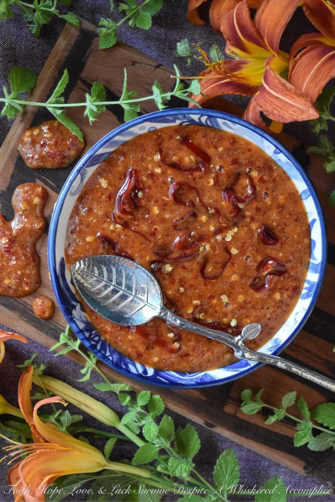 Sweet & Spicy Red Chili Garlic Sauce - This sweet and spicy homemade condiment, made with red chili peppers and a healthy amount of garlic, can be used to make just about any food more flavorful. It's really up to you how to use this sauce. You can use it to baste grilled seafood, marinate steak, or even to enhance the flavor of your favorite salad dressing or dip.